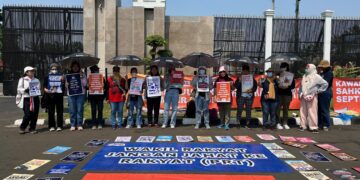 Aksi jaringan Koalisi Sipil untuk UU Perlindungan Pekerja Rumah Tangga (UU PPRT)