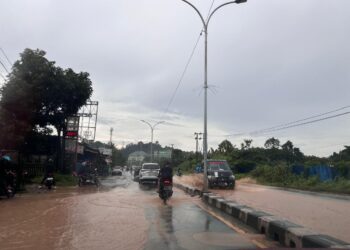 Ilustrasi jalan banjir di Kalimantan Timur (srana