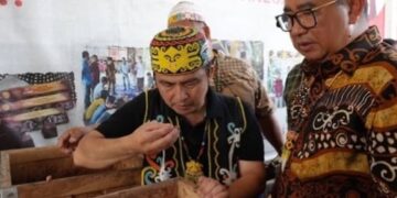 Pj Gubernur Kaltim saat mengunjungi Lung Anai