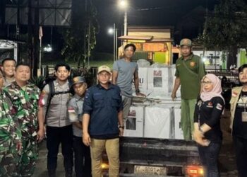 Pengawalan distribusi logistik surat suara