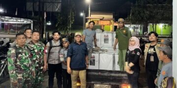 Pengawalan distribusi logistik surat suara