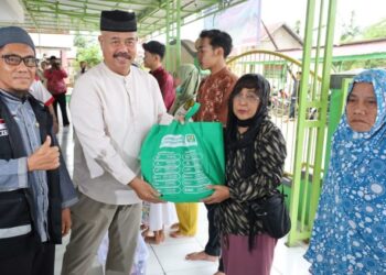 (Bupati Kukar Memberikan Bantuan Paket Sembako/Istimewa)