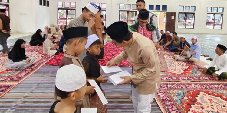 (Penyerahan Bingkisan dan Santunan/Istimewa)