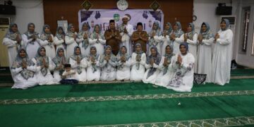 (Foto Bersama Anggota DWP dan Asisten I Setkab Kukar/Istimewa)