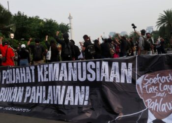 Aksi Kamisan/Santiko Budi via Shutterstock